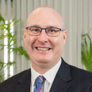 Dr John Cowie